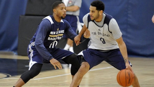 Pre-season stint: Corey Webster goes up against Eric Gordon during his short-lived stay in New Orleans.
