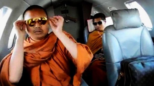 'Most monks are good monks, but there are exceptions': Wirapol Sukphol (left) during one of his frequent charter flights. 