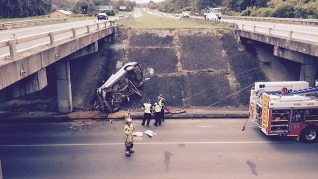 The vehicle came to rest on its side below the Bruce Highway at Palmview.