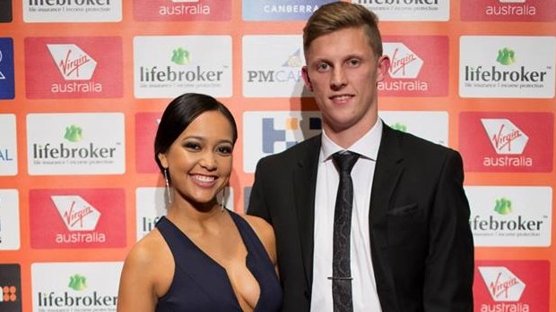Lachie Whitfield and his then partner Sammi Nowland in 2014.