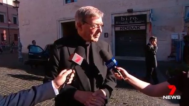 Cardinal George Pell speaking to reporters in Rome on Wednesday.