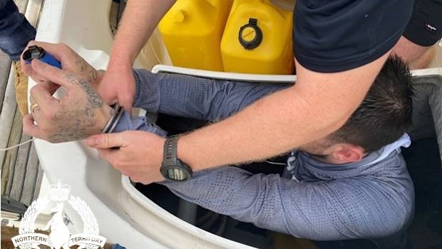 Sydney fugitive Mark Horne found in the hull of Darwin boat.