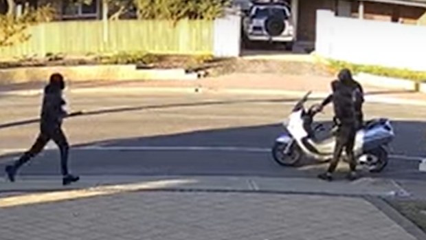 A screenshot from CCTV footage showing the suspects making their escape.