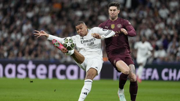 Kylian Mbappe of Real Madrid scores.