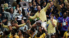 Athletes of Australia wave during the 2024 Summer Olympics closing ceremony at the Stade de France, Sunday, Aug. 11, 2024, in Saint-Denis, France.