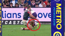 James Tedesco trips Ryan Papenhuyzen during the Roosters loss to the Storm.