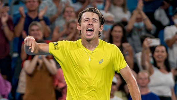Australia's Alex De Minaur celebrates a huge ATP Cup victory over Italy's Matteo Berrettini.