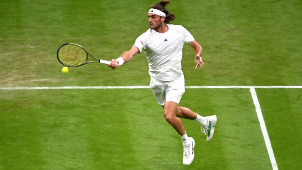 Stefanos Tsitsipas of Greece plays a forehand against Andy Murray of Great Britain in the Men's Singles second round match during day four of The Championships Wimbledon 2023 at All England Lawn Tennis and Croquet Club on July 06, 2023 in London, England. (Photo by Mike Hewitt/Getty Images)