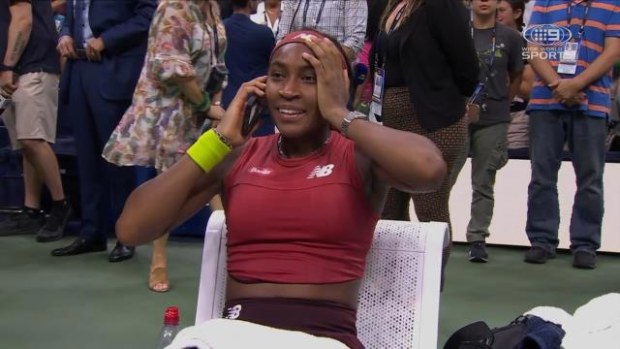 Coco Gauff answers phone calls after defeating Aryna Sabalenka to win her maiden grand slam title.