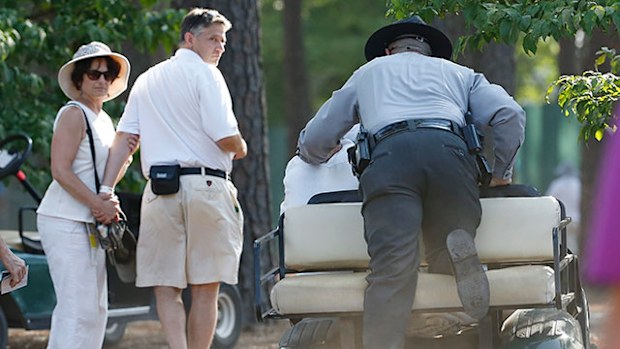 The state trooper chased the golf cart down after the driver struck him in the leg (AAP).