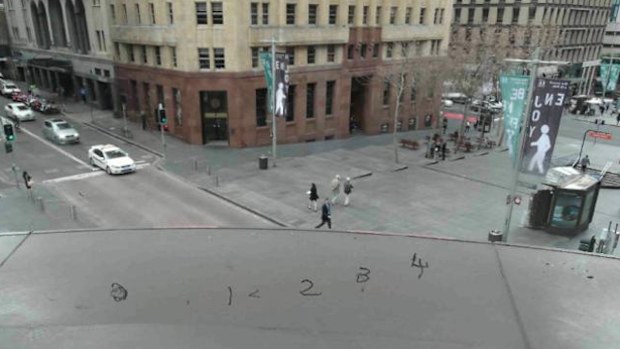 Police snipers positioned inside the Westpac building used numbered markers to indicated specific windows on the Lindt Cafe.
