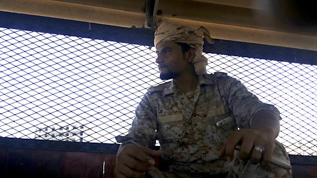 Naquib al-Yahri, the chief of Aden Central Prison, sits in the facility in this May 9, 2017 photo in Aden, Yemen. A Yemeni security force created by the United Arab Emirates runs a closed wing, part of a network of secret prisons in southern Yemen where hundreds have disappeared during the hunt for al-Qaeda suspects.  (AAP)