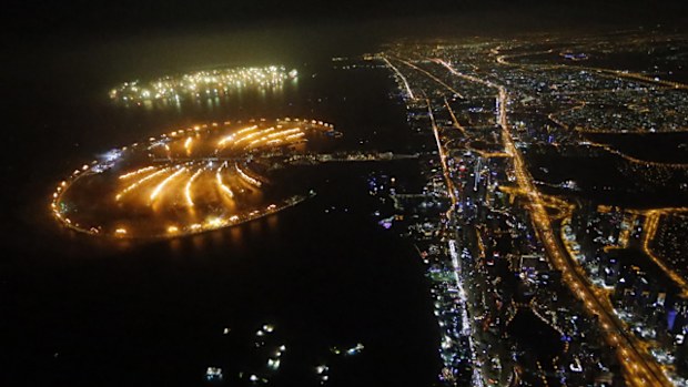 Fireworks explode over Palm Jumeirah in Dubai on January 1, 2014 to celebrate the new year.