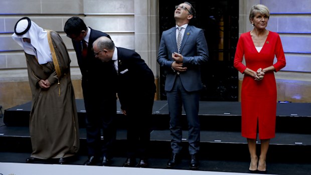 Germany's Foreign Minister Heiko Maas, second from right, and Australia's Foreign Minister Julie Bishop, right, prepare to pose for a group picture at the G20 foreign ministers meeting at San Martin Palace in Buenos Aires, Argentina (AAP).