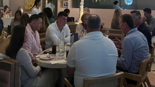 Knights centre Bradman Best (centre, white shirt) was seen meeting with coach Adam O'Brien and football boss Peter Parr.
