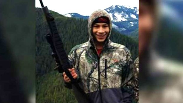 Jaylen Fryberg poses with a gun.