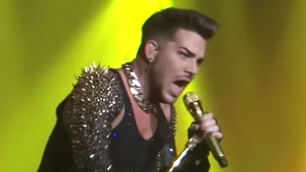 Adam Lambert performing with Queen.