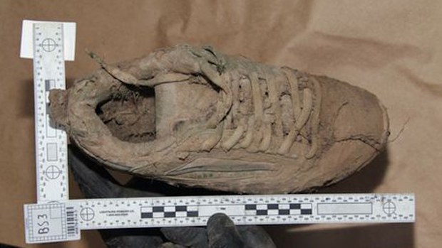 A muddy shoe, believed to be that of Daniel Morcombe, found at Glasshouse Mountains. (Supplied)
