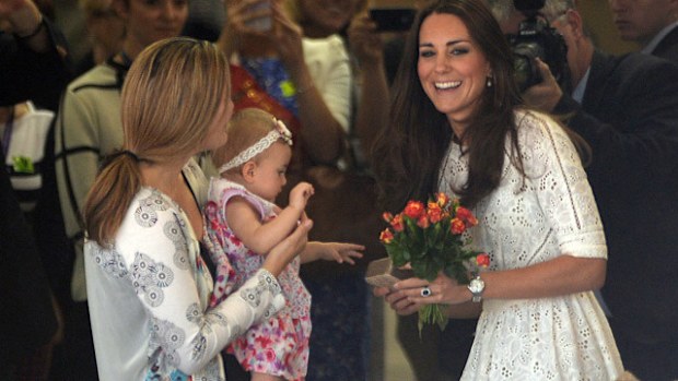 The Duchess of Cambridge, Catherine speaks with a mother and young baby during a visit by The Duke and Duchess to the Royal Easter Show in Sydney (AAP). 