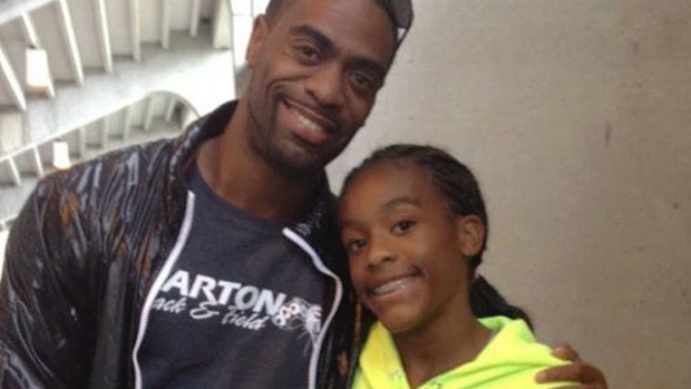 Tyson gay and his daughter Trinity. (Twitter)