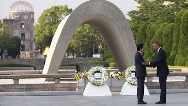 Historic meeting ... US President Barack Obama meets Japan's Shinzo Abe at the Peace Memorial Park in Hiroshima. (AAP)