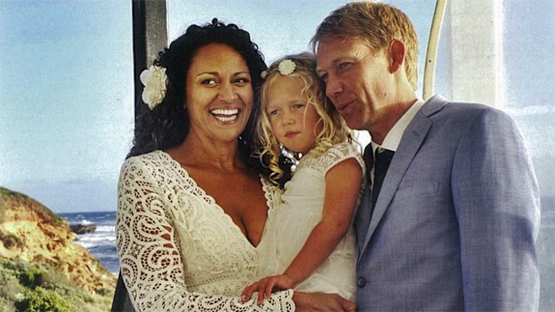 Aminah Hart and Scott Anderson with their daughter Leila on their wedding day. (Supplied)