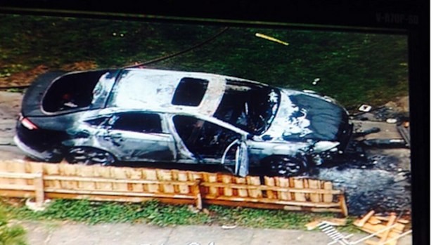 Police have set up a crime scene around the exploded car (Twitter).