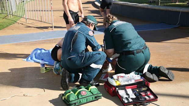 Paramedics treat an athlete at the Endure Batavia Triathlon in Western Australia. (Everything Geraldton)
