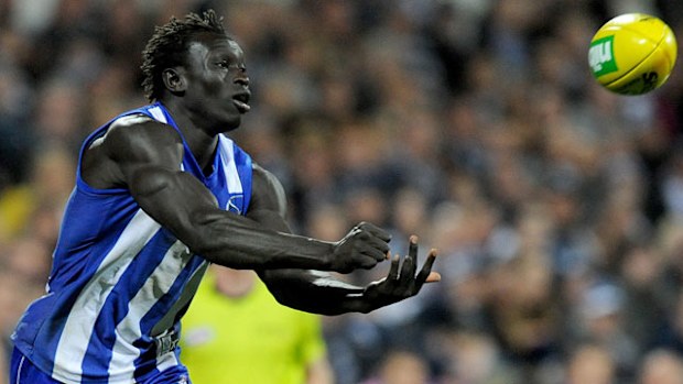 Majak Daw playing for North Melbourne last year. (AAP)