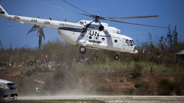UN aid arrives by helicopter in southwest Haiti, after Hurricane Matthew left over 800 dead and thousands without homes. (AP)