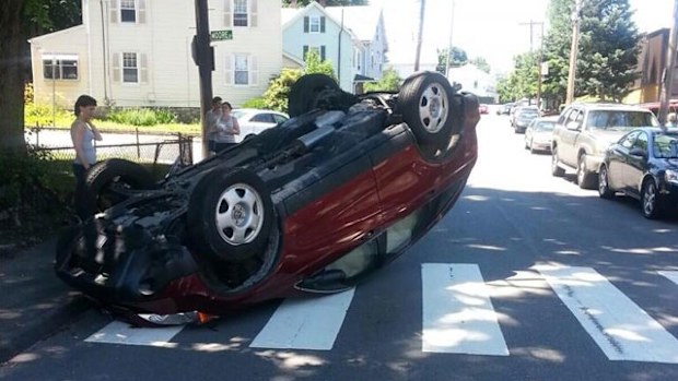 The car, flipped during a driving lesson. (Waltham Police)