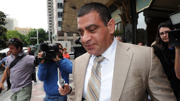 Sam Ibrahim walks out of Downing Centre Court after hearing in 2011. (AAP)