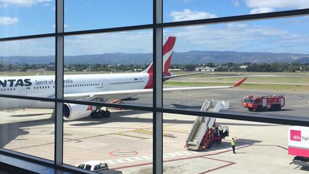 The grounded Qantas plane in Adelaide. (Tim Brewer)