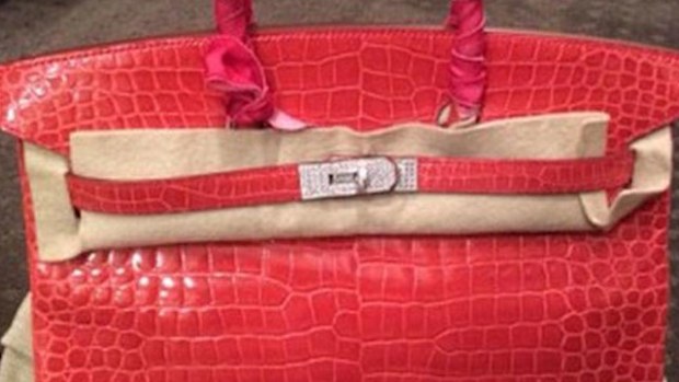 A red Hermes Himalayan Crocodile bag similar to the one stolen,