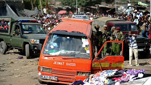 Police investigators comb through the scene of an explosion that claimed at least ten lives. (Getty)