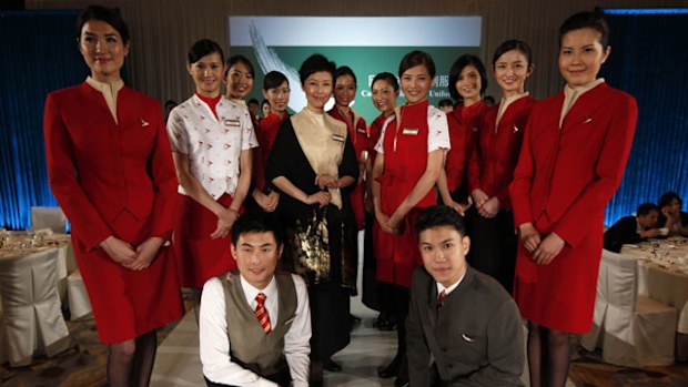 The Cathay Pacific uniform as modelled by staff in 2011. (AAP)