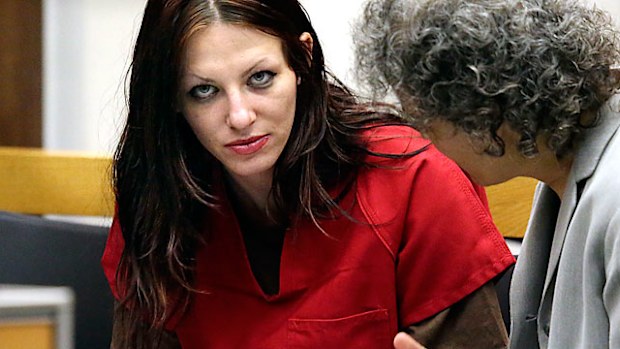 Alix Tichelman, left, of Folsom, California, confers with public defender Diane August during her arraignment in Santa Cruz Superior Court Wednesday, July 9, 2014. (AAP)
