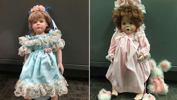 Two of the porcelain dolls left on the doorsteps. (Twitter @OCSD) 