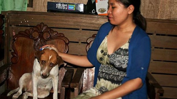 Bunny at home with her owner Ailyn Metran in Tacloban City, Philippines. (Getty)