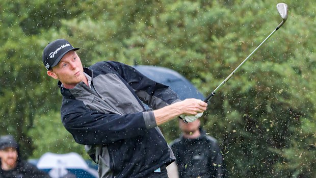 Ryggs Johnston plays his second shot on the third hole on day three of the 2024 Australian Open.