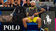 Nick Kyrgios slumps in his chair during his Australian Open round one loss against Jacob Fearnley.  