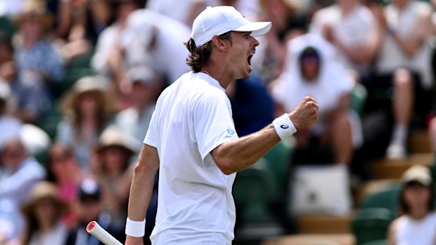 Alex De Minaur celebrates winning the third set against Arthur Cazaux at Wimbledon.