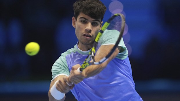 Carlos Alcaraz plays a shot during his loss to Casper Ruud.