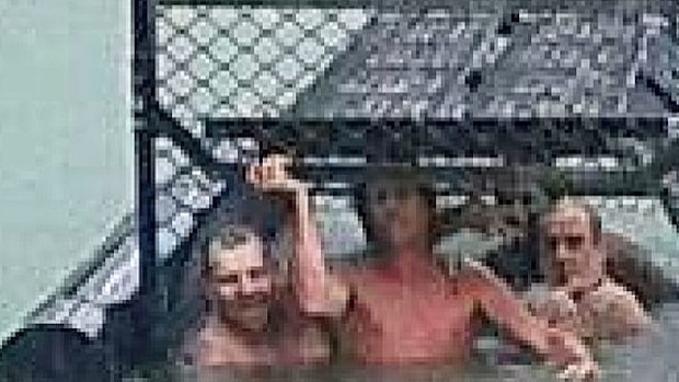 The four men in the croc trap at Port Douglas marina. (Photo: Facebook).