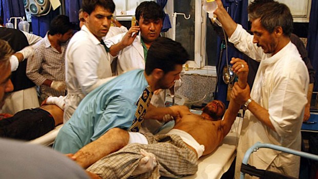 A victim is treated in hospital after the attack. (Photo:AFP).