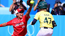 Michelle Cox #47 of Team Australia beats the throw to Minori Naito #14 of Team Japan.