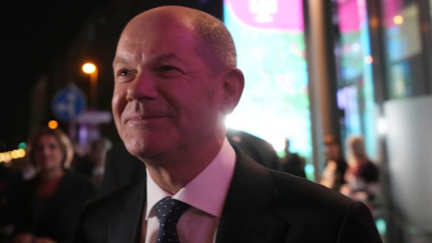 Olaf Scholz, Finance Minister and SPD candidate for Chancellor, leaves after attending a TV broadcast on the parliamentary elections in Berlin on Sunday. 