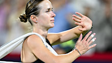 Elina Svitolina of Ukraine walks off the court following her loss against Naomi Osaka.