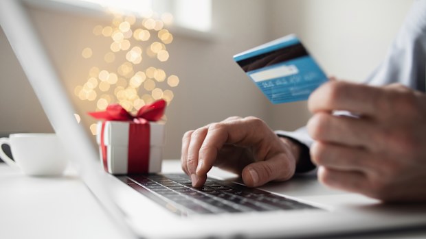 Man ordering Christmas presents online