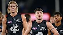 Carlton stars Tom De Koning and Sam Walsh look dejected after losing the round three AFL match between Carlton Blues and Western Bulldogs at Marvel Stadium, on March 28, 2025, in Melbourne, Australia. (Photo by Quinn Rooney/Getty Images)